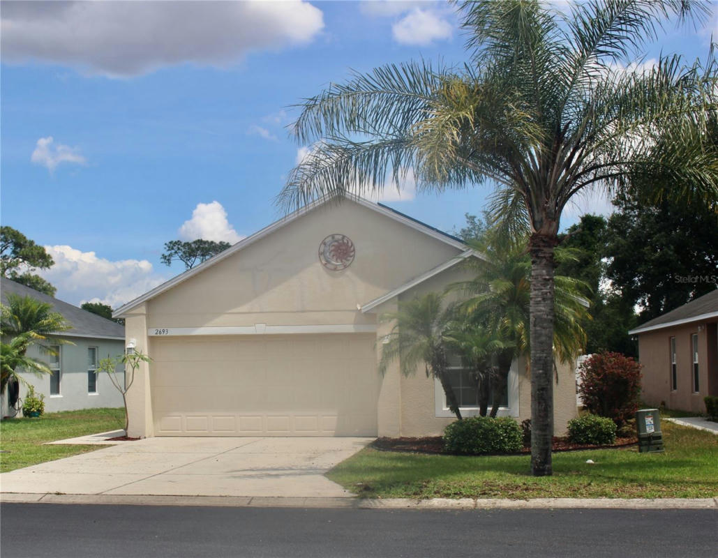 2693 WHISPERING TRAILS DR, WINTER HAVEN, FL 33884, photo 1 of 24