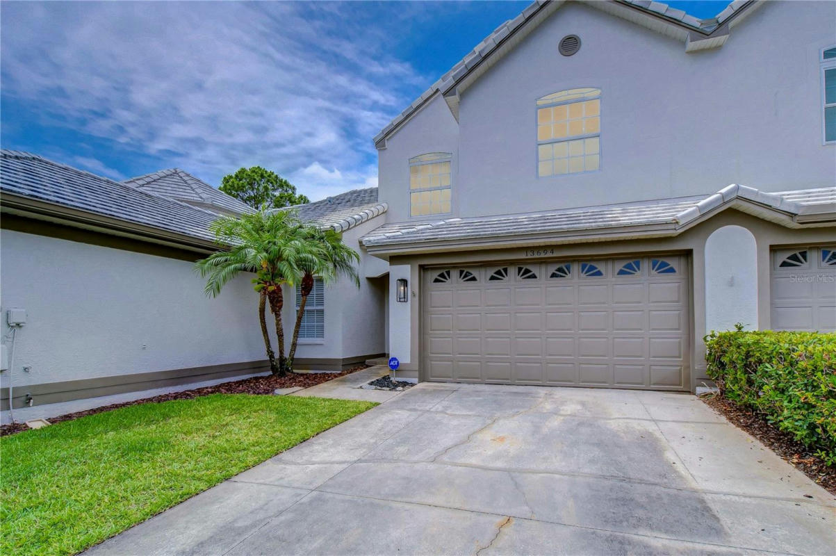 13694 EAGLES WALK DR, CLEARWATER, FL 33762, photo 1 of 59