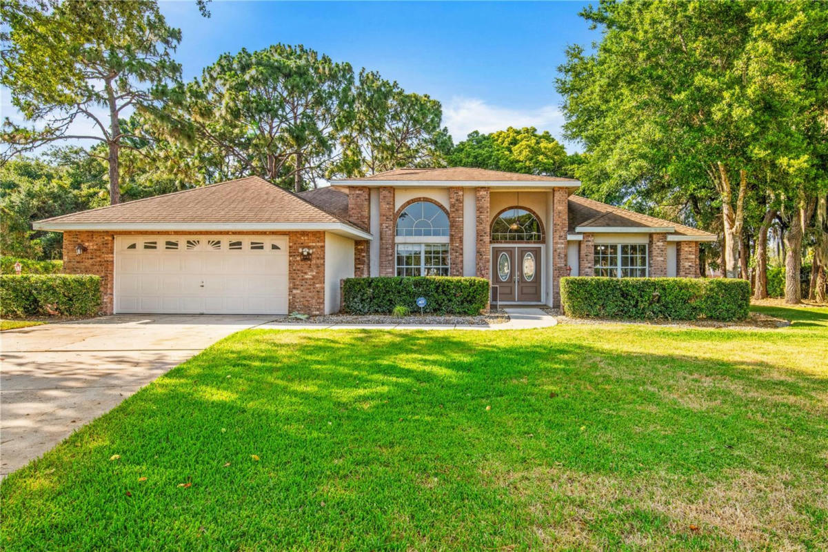 223 FOREST WOOD CT, SPRING HILL, FL 34609, photo 1 of 50