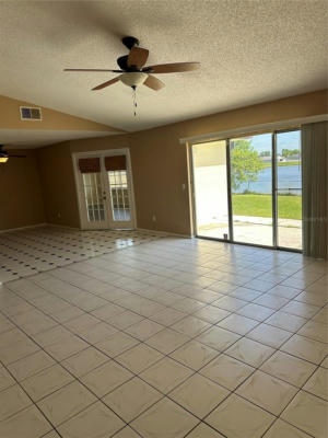 125 FLORAL CT, KISSIMMEE, FL 34743, photo 4 of 37