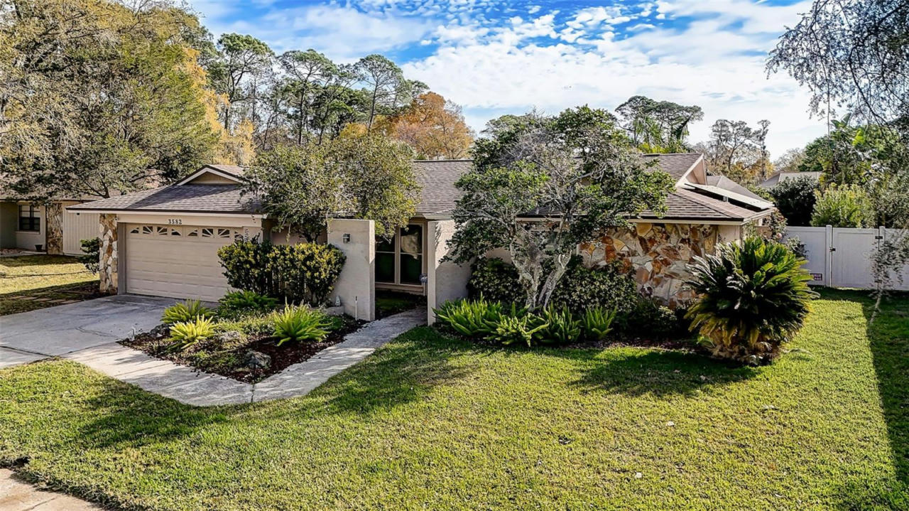 3582 FAIRWAY FOREST DR, PALM HARBOR, FL 34685, photo 1 of 74