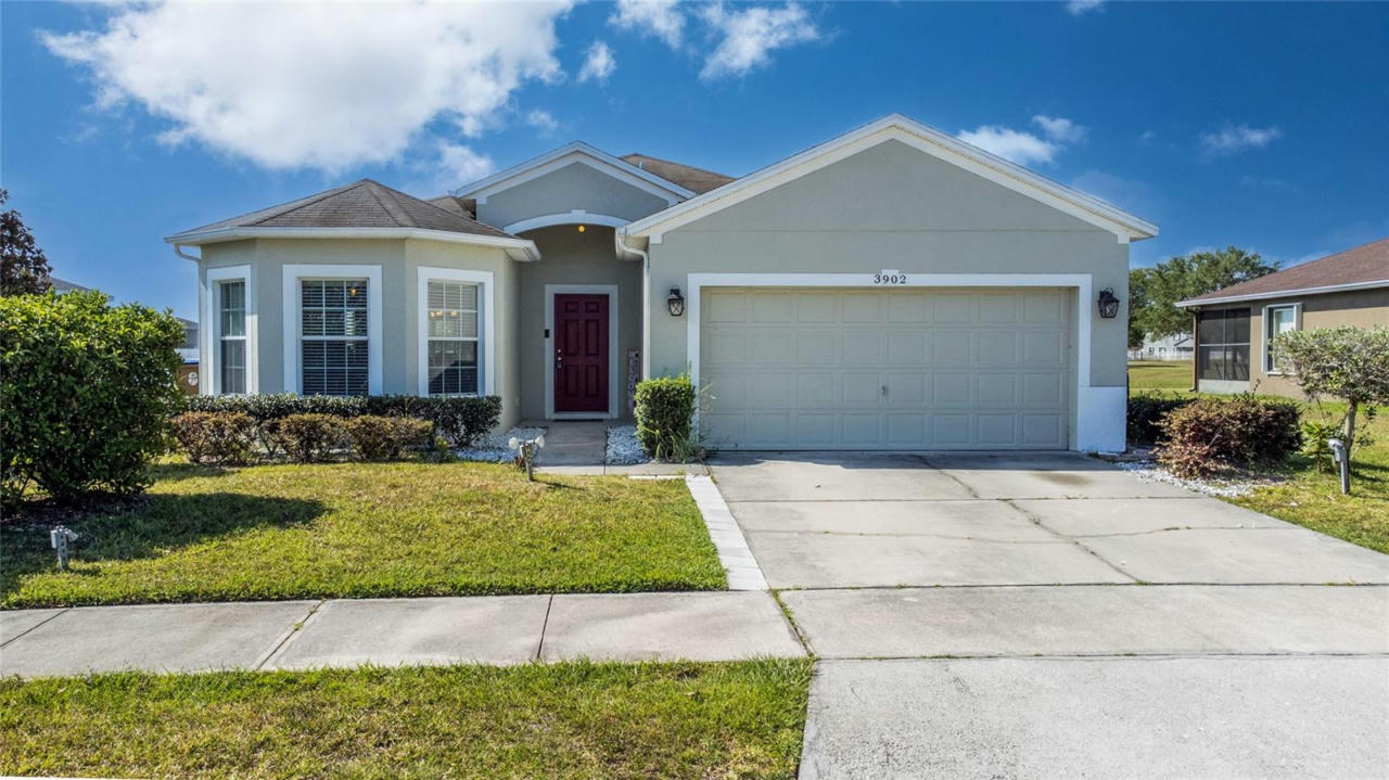 3902 FLOWERING ORCHID LN, KISSIMMEE, FL 34744, photo 1 of 44