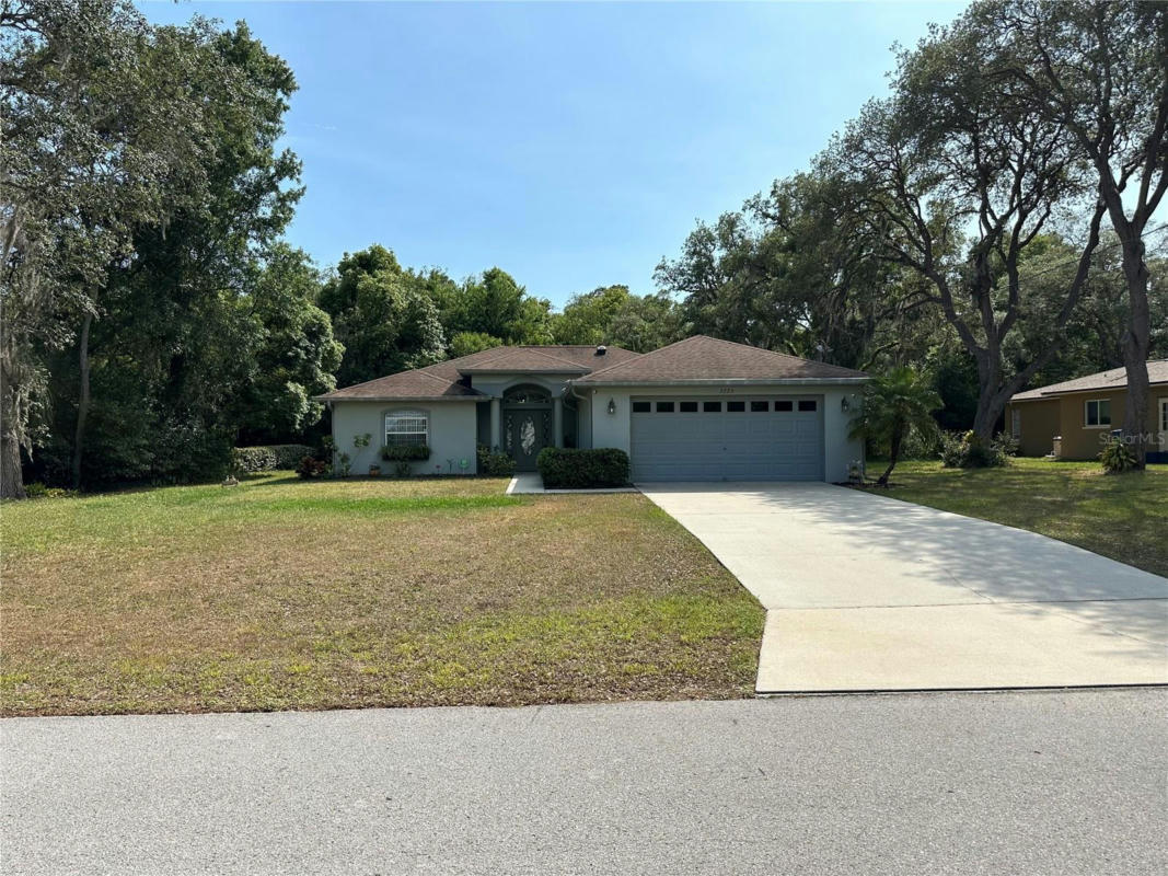 7775 HOLIDAY DR, SPRING HILL, FL 34606, photo 1 of 39