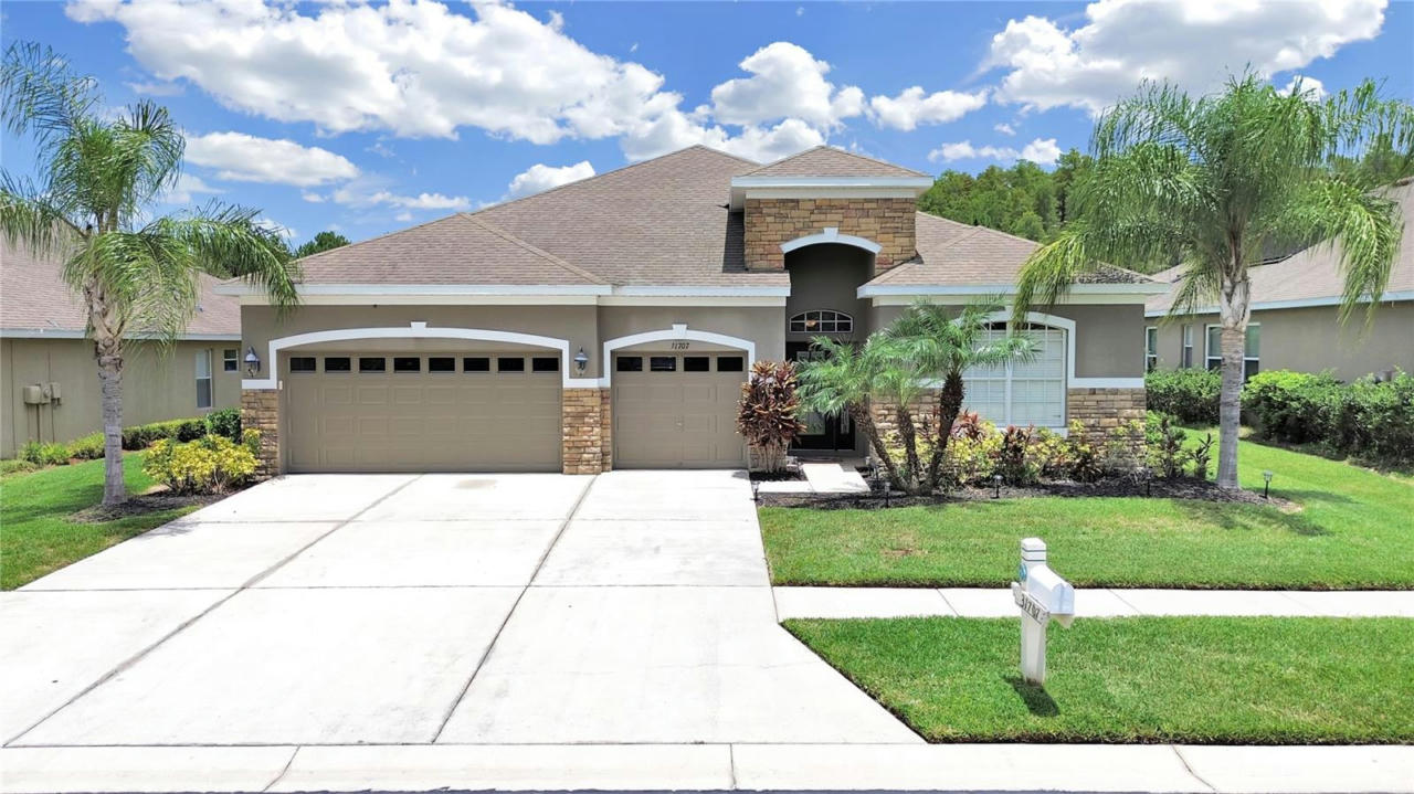 31707 HOLCOMB PASS, WESLEY CHAPEL, FL 33543, photo 1 of 57