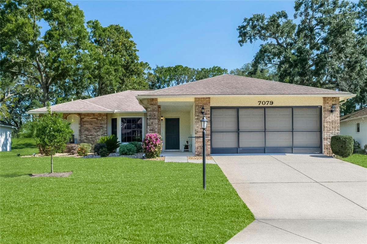 7079 CROWN OAKS DR, SPRING HILL, FL 34606, photo 1 of 74