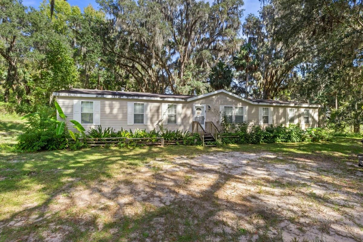 6588 NW 223RD ST, MICANOPY, FL 32667, photo 1 of 23