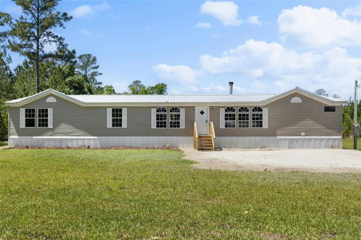 20980 NW 74TH AVE, STARKE, FL 32091, photo 1 of 30
