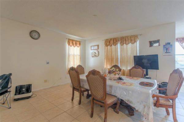 7242 COUNTRY RUN PKWY, ORLANDO, FL 32818, photo 4 of 17