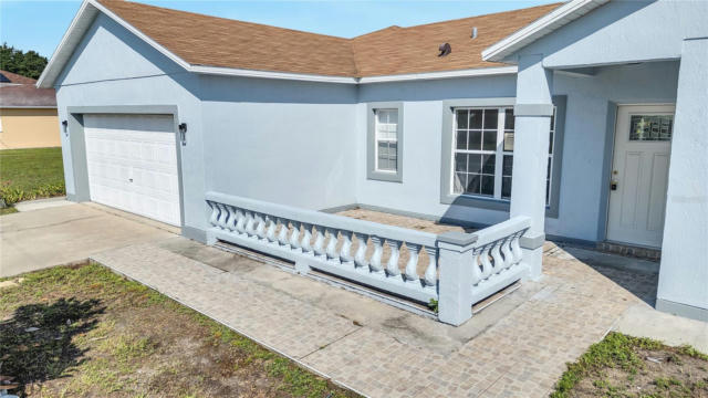 243 BEDFORD DR, KISSIMMEE, FL 34758, photo 4 of 42