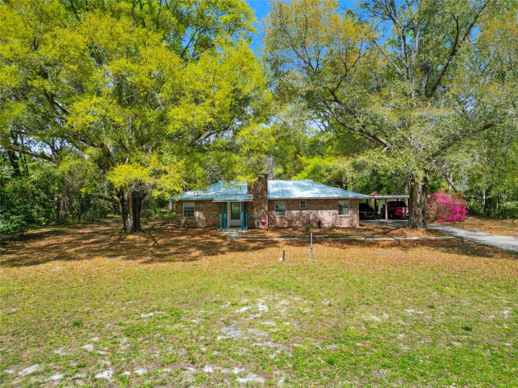 225 SE HAPPY VALLEY GLN, HIGH SPRINGS, FL 32643, photo 1 of 25